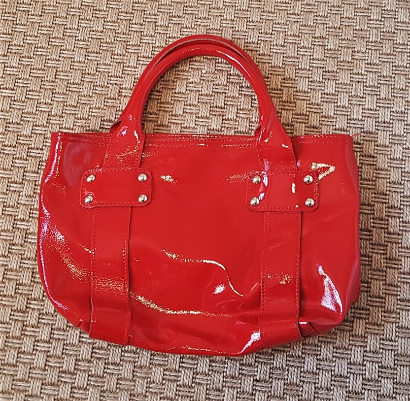 Innue red shiny wet look leather handbag The Frockery