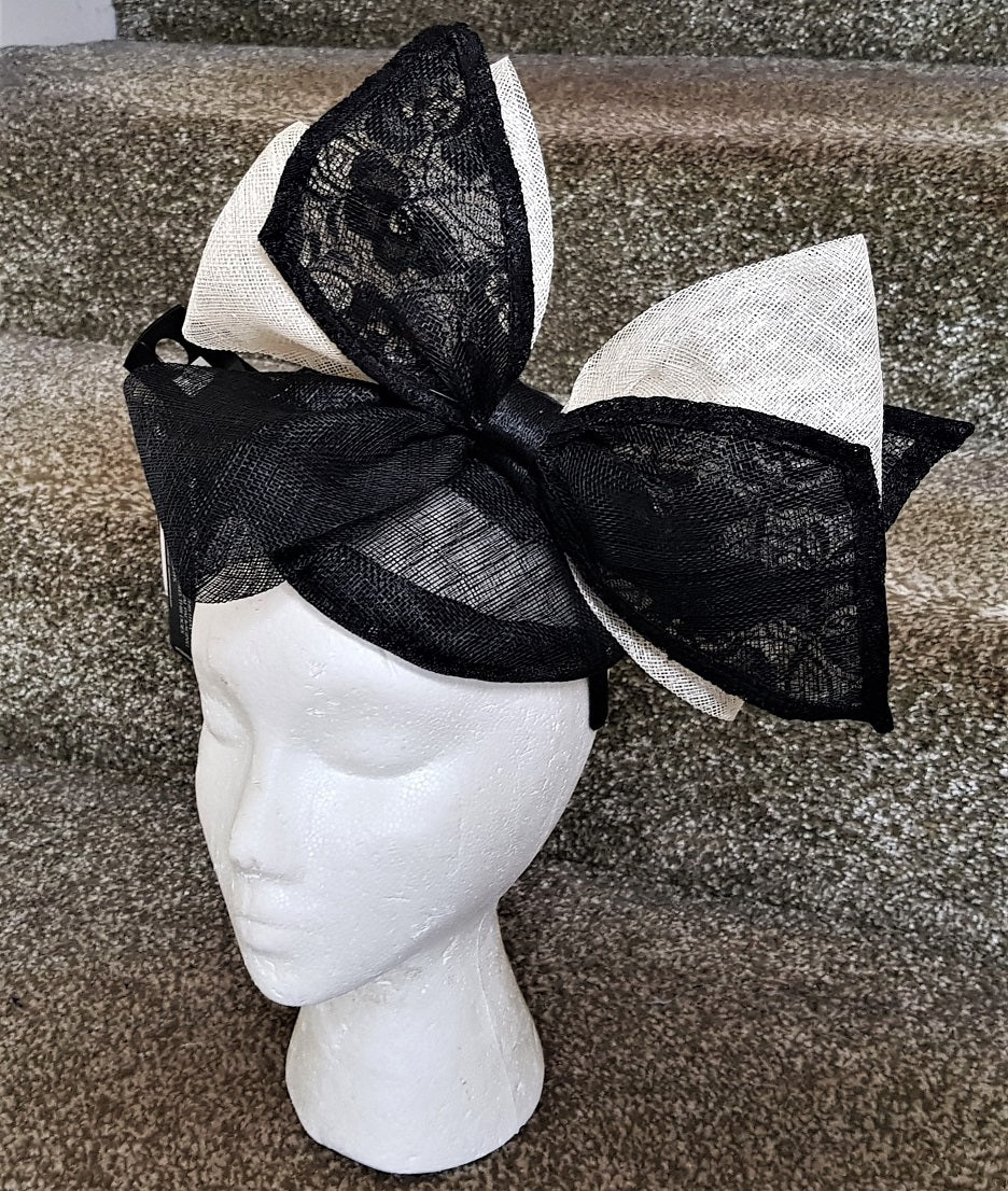 M S black and cream fascinator hat