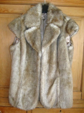 Per Una faux fur sleeveless jacket