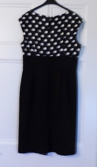 Black shift dress with polka dot bodice